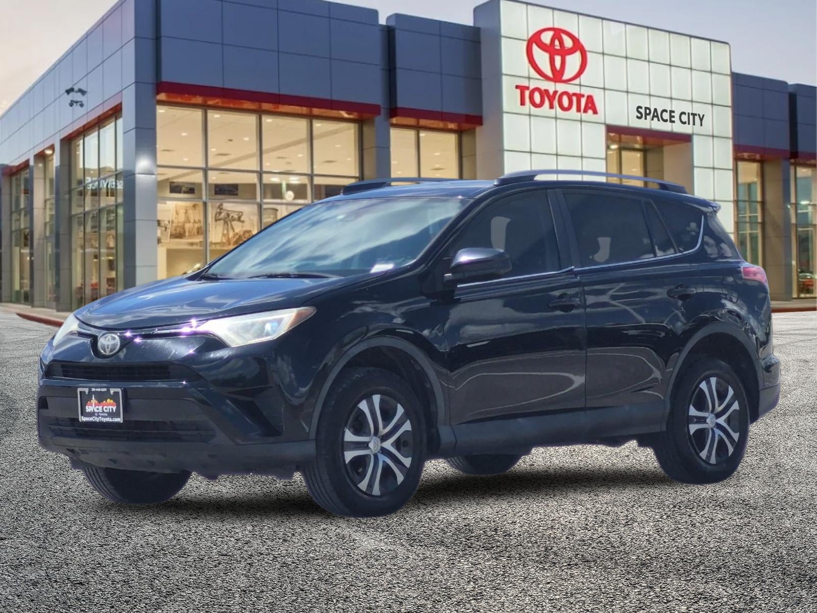 Used 2018 Toyota RAV4 LE with VIN 2T3ZFREV1JW492677 for sale in Humble, TX